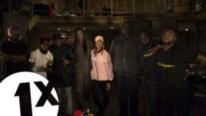 Sian Anderson rallies MC's for a cold freestyle over live band