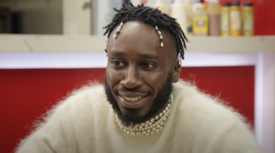 Kojey Radical Talks Sneaky Links, Superheroes & More On 'Chicken Shop Date' With Amelia