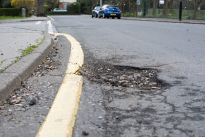 Record 7 figure compensation payout handed to driver who hit pot hole