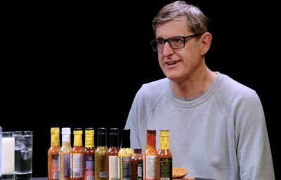 Watch Louis Theroux take on the 'Hot Ones' challenge